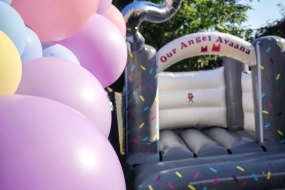 10 by 12 ft Grey and white bouncy castle 