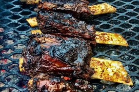 Beef ribs with an apple and star anise glaze.