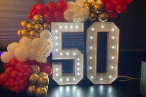 Balloon arch & LED numbers for a 50th birthday party 
