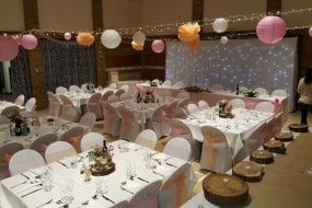 Venue dressing in Bosham village hall chair covers, table linen and starlight backdrop