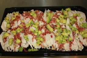 Chicken platter with blue cheese dressing, bacon and avocado