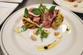 Roasted peach, parma ham & almond salad 