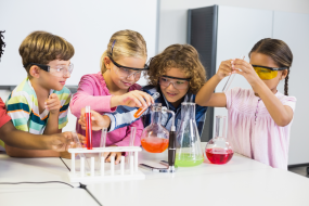 Kids experimenting with "matter" at the Science of Sound