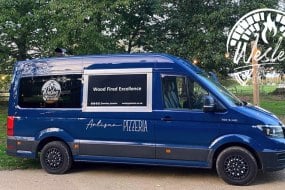 Custom converted van with woodfired kitchen