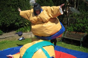 Bouncing Crazy Bouncy Castle Hire Sumo Suit Hire Profile 1