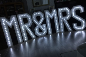 mr & mrs led light up hire £175