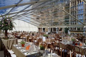 Summer wedding is a spectacualr location under clear roofs.