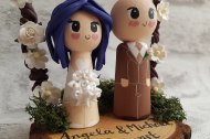 Cute wooden bespoke custom bride and groom wedding cake toppers