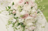 Teardrop bouquet of English roses, sweet peas and larkspur