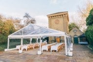 Clear marquee, Guests seated in rows