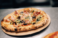 Mena's Woodfired Pizzas