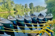 shiny new canoes and equipment