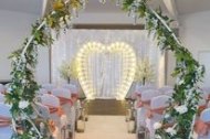 Floral arch and light up love heart arch