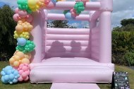 Pastel pink bouncy castle