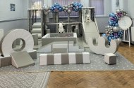 Our luxury large soft play and frame with added balloon garlands