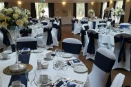  A range of chair covers and sashes for hire, including setup and collection. Centerpieces also available for hire in silk or fresh arrangements. 