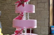 Four-tier pink cake with Stargazer lilies