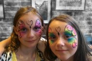 two beautiful face painted butterflies