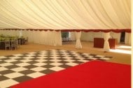 Large function for Hilton. Black and white dance floor. 15m wide marquee.