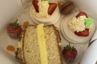 Strawberry meringues with fresh cream, lemon drizzle loaf cake filled with lemon butter cream, macaroons 
