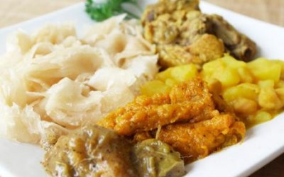 Curried Chicken, Potatoes,  Chick Peas, Pumpkin and Buss Up Shot Roti