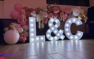 Organic balloon garland with light up letters