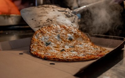 Taking Pizza Out The Oven