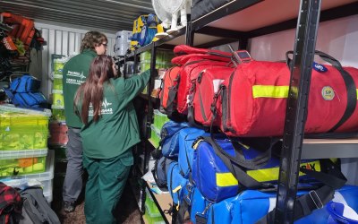 Logistics team preparing kit bags ahead of a large deployment