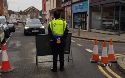 road closure in place, directing the public around the road closure