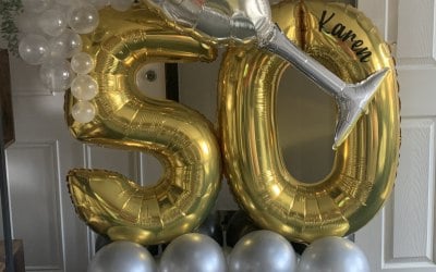 Double digit floor stack with champagne glass & bubbles 