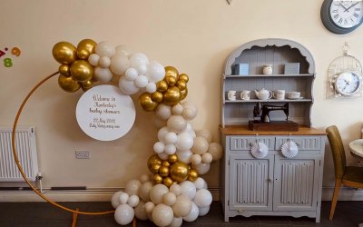 Baby shower half hoop with white, nudes and gold.