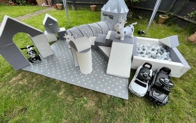 We have soft play in neutral colours like grey/white, pastel pinks and blues!
