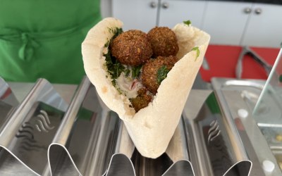 Our Falafel Pitta with homemade hummus, homemade chilli sauce, tahini and our signature salad.