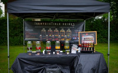 Event set up. Drinks dispensers to give out samples, drinks kept in cooler boxes.