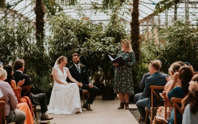 A glasshouse wedding ceremony