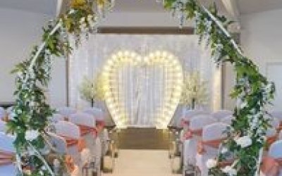 Floral arch and light up love heart arch
