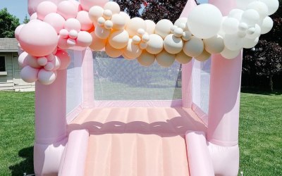 Pastel pink bouncy castle