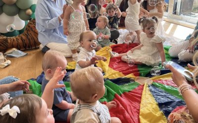 Babies all having so much fun at the party 