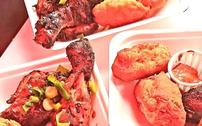 Jerk Chicken served with Fried Festivals