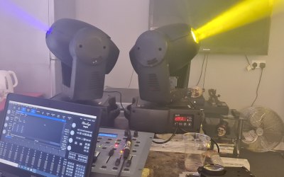 Light engineer programming the show lights 