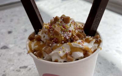 KitKat and fudge rolled ice cream finished with whipped cream