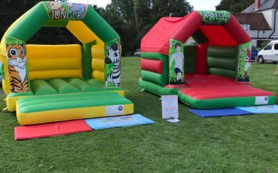 Yellow and Green Jungle Castle and Red and Green Football Castle 
