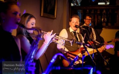Female horn section. Live Party band