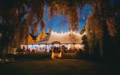 Traditional Petal Pole marquee with festoon lighting over the top :)