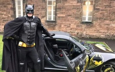Standing by the car for photos