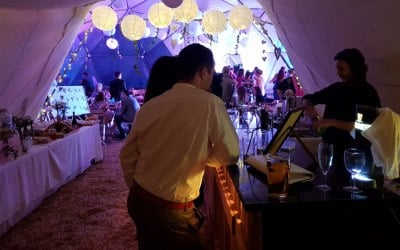 The 'Driftwood Bar' at night in the atmospheric geodome
