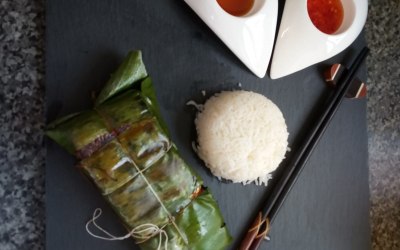 Baked salmon in banana leaf