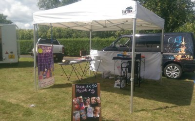 trade stall set up for face painting / tattoos