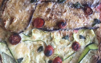 Half Parmigiana - Aubergine, Parmesan, Home-baked Tomatoes, San Marzano Tomato Sauce, Basil, Herb Oil / Half Verdi - Ricotta, Marscarpone, Parmesan, Mint, Lemon Chilli Courgettes, Home-dried Tomatoes, Basil, Herb Oil
