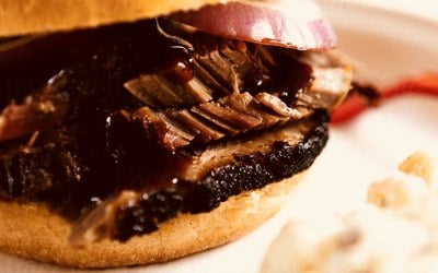 Prime USDA brisket smoked with hickory wood soaked in Jack Daniels bourbon 